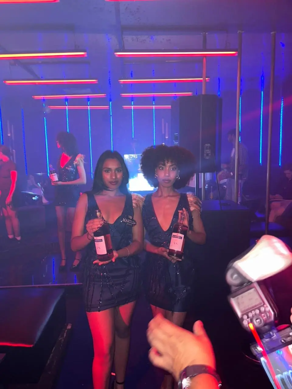 Nightclub promoters working a bar activation in East London