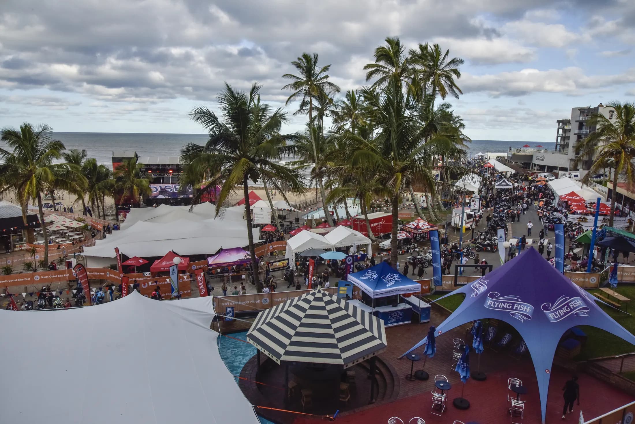 Aerial view of a branded beach festival activation